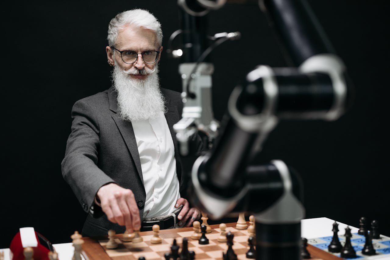 An older man engages in a strategic chess game with a robotic arm, illustrating the blend of tradition and technology.